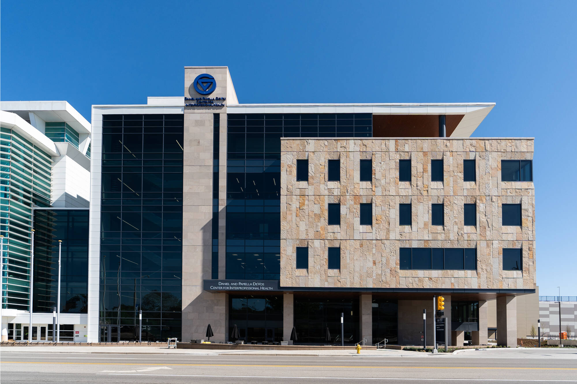 Exterior of The Daniel and Pamella DeVos Center for Interprofessional Health (DCIH).
